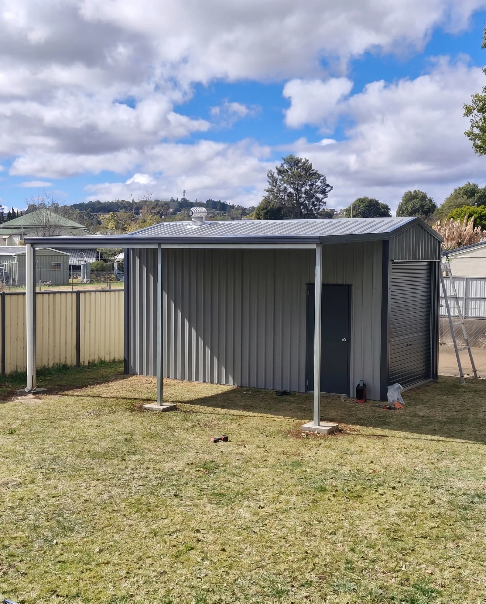 Grey garden shed with skillion roof